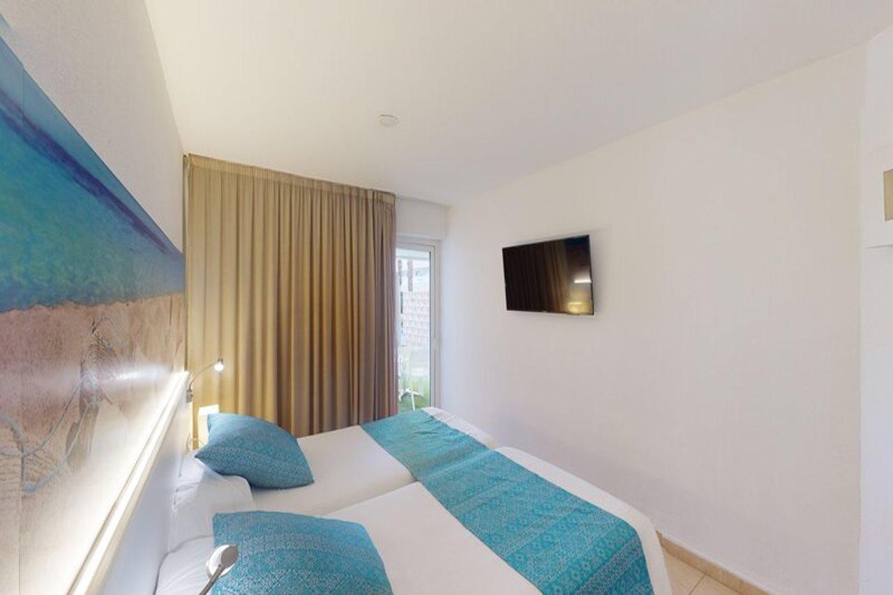 Aparthotel Tropic Garden Santa Eularia des Riu Eksteriør bilde